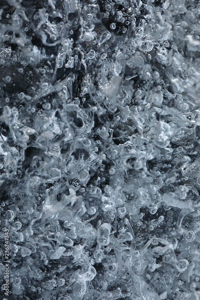 Details and bubbles on the ice of a glacier
