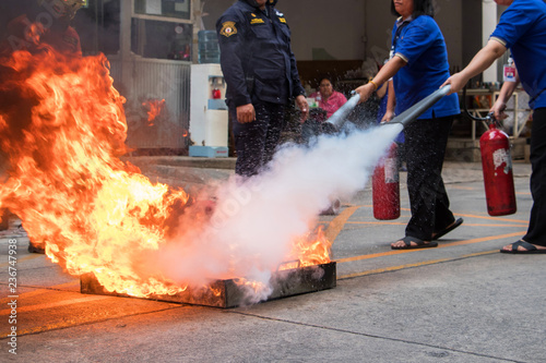 Employees firefighting training,Extinguish a fire. photo