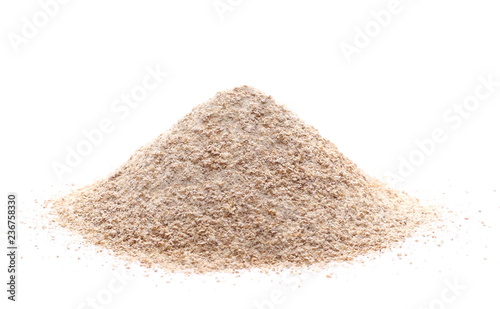 Fotografia Pile of integral wheat flour isolated on white background