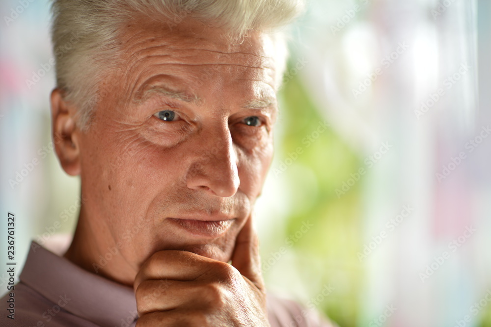 Portrait of a senior man thinking about something Portrait of a senior man thinking about something