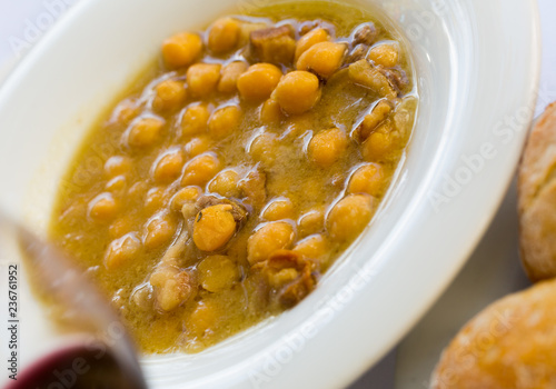 Chickpea stewed with iberian bacon with red wine