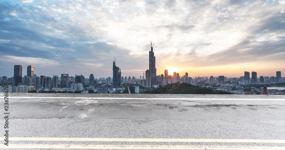 Panoramic skyline and buildings with empty road Panoramic skyline and buildings with empty road