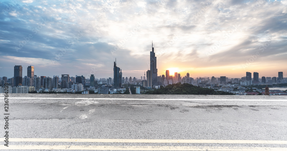 Panoramic skyline and buildings with empty road 