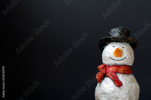Snowman on black background