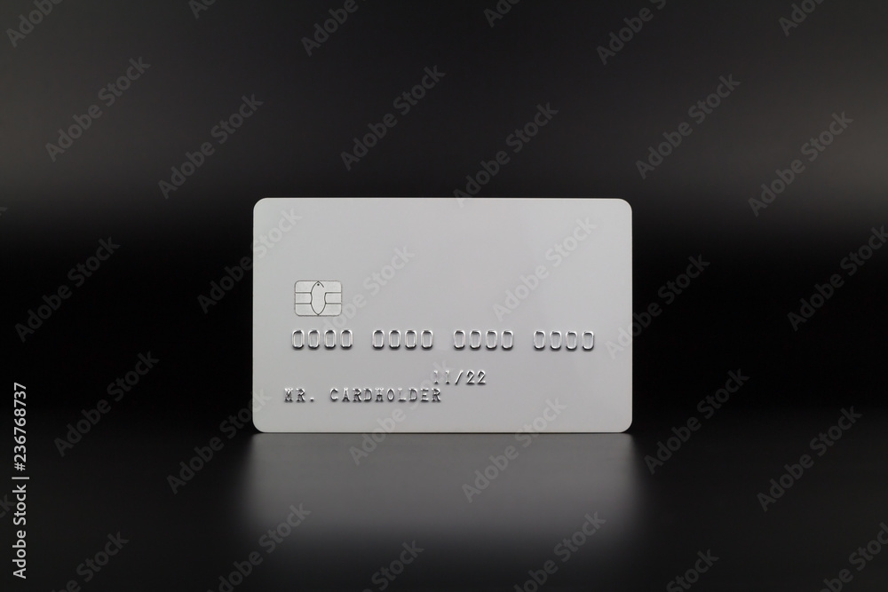 White credit card on luxury dark background - obrazy, fototapety, plakaty 