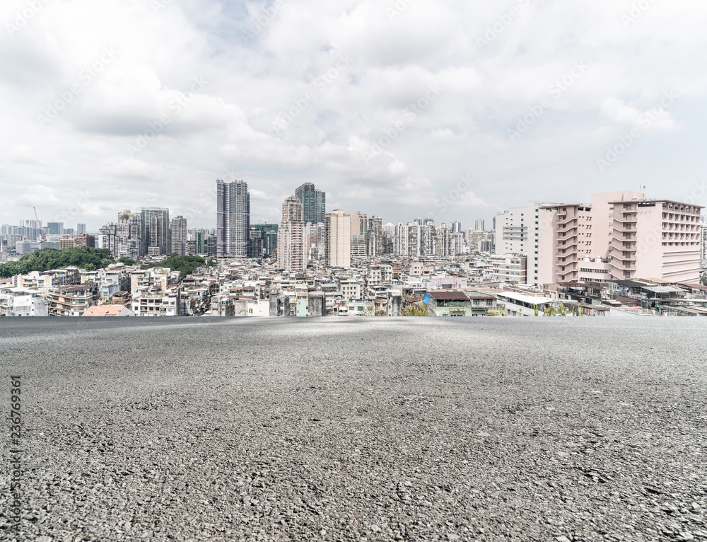 Panoramic skyline and buildings with empty road Panoramic skyline and buildings with empty road