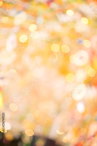 Gold bokeh abstract glitter light on background. Golden christmas light shine bright holiday magic decoration.