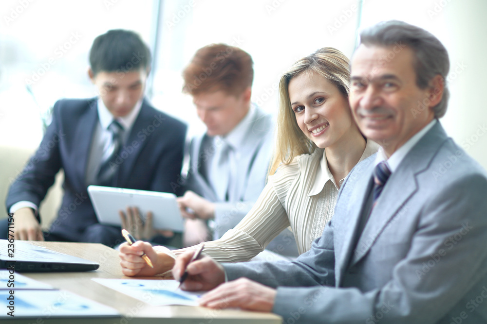 businessman and assistant in the workplace in the office businessman and assistant in the workplace in the office