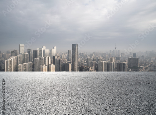 Panoramic skyline and buildings with empty road 