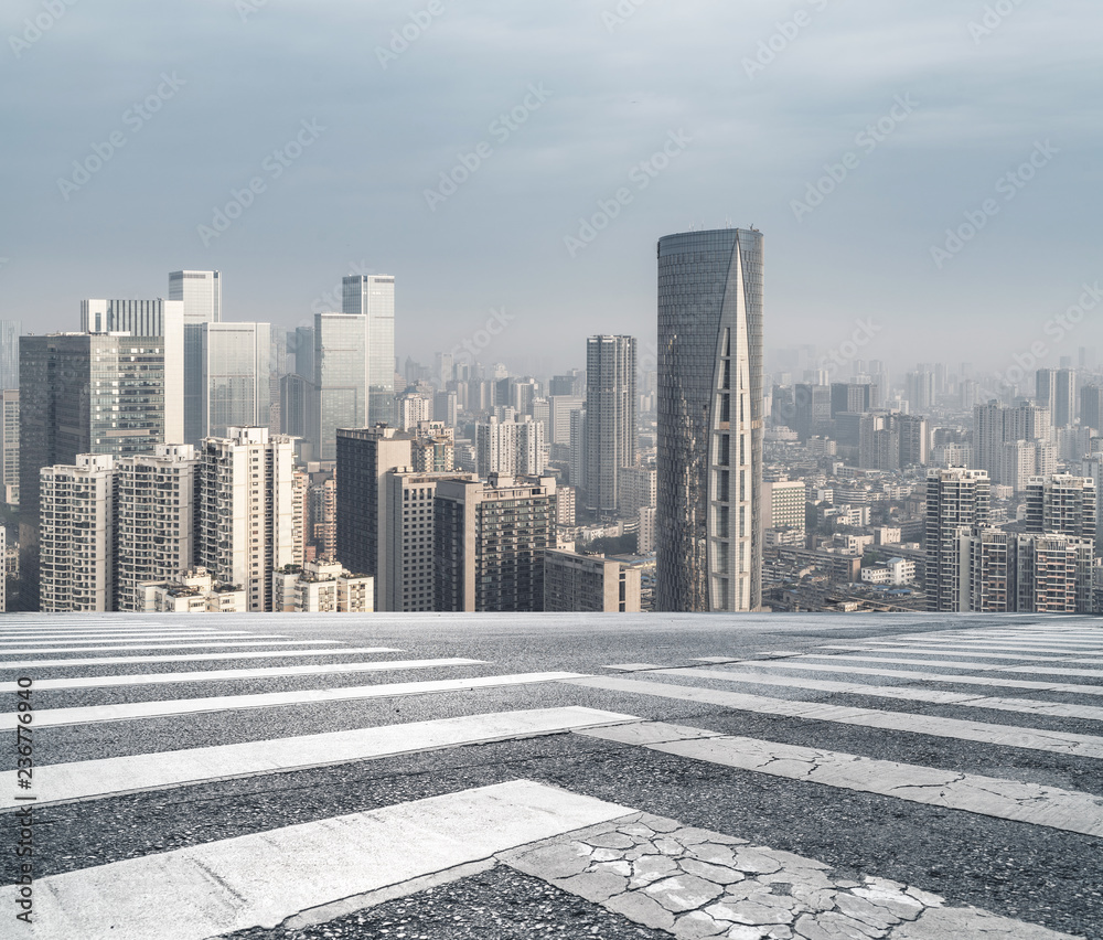 Panoramic skyline and buildings with empty road