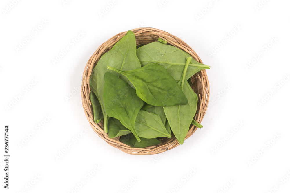 Brazilian Spinach in a bowl. Spinacia oleracea. Top view Brazilian Spinach in a bowl. Spinacia oleracea. Top view