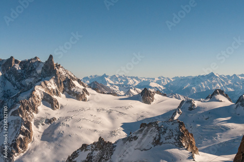 View over the French Alps  from the Aiguille du Midi cable on a winter afternoon  just before Christmas.