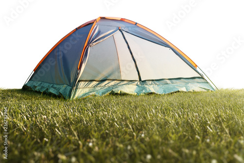 Camping tent in grass isolated on a white background.jpg