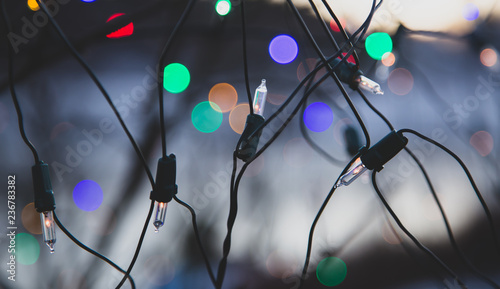 Close up picture of Christmas light with colorful bokeh background