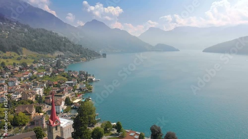 Village Weggis, lake Lucerne (Vierwaldstatersee), Rigi mountain and Swiss Alps in the background near famous Lucerne (Luzern) city, Switzerland
 photo