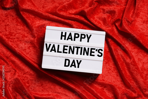 happy valentines day - text on lightbox or light box sign on red velvet background