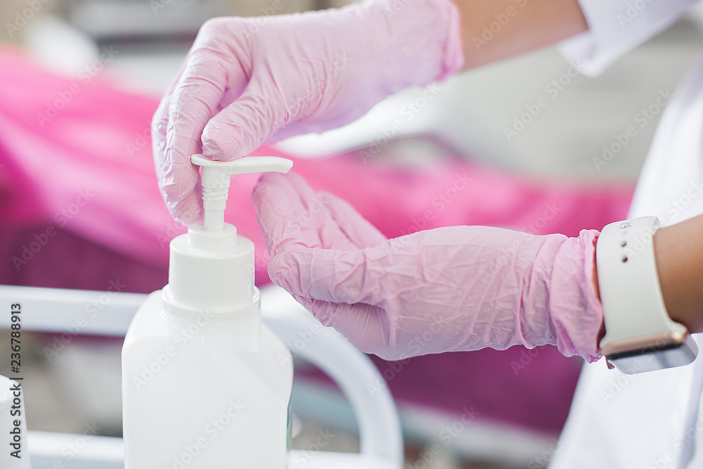 Close up still of hands making desinfaction. Background of sterilization hands, medical equipment and devices.
