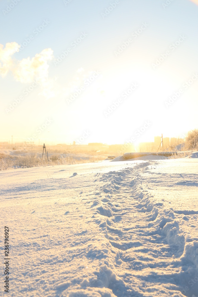 snowy path and sunset