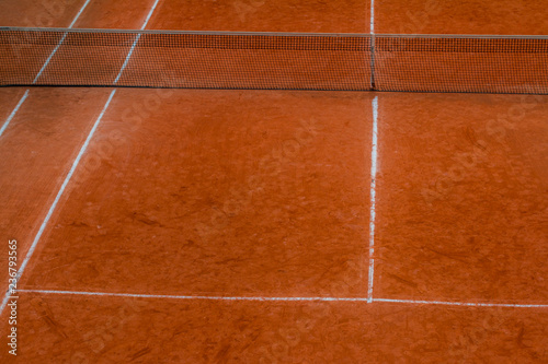 high angle view of clay tennis courts © hyotographics