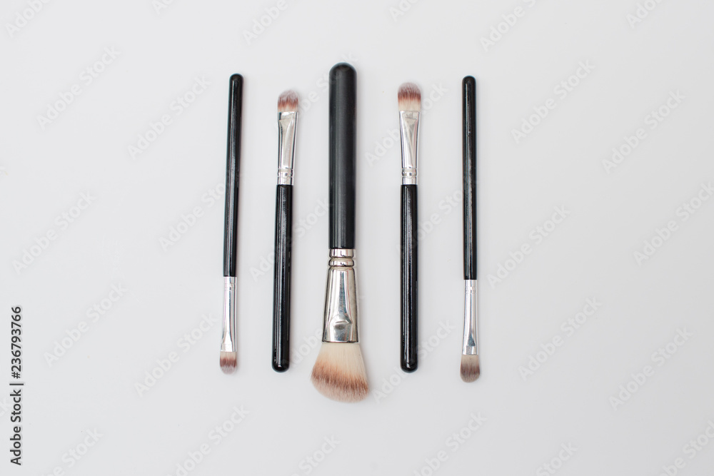 woman brushes woman brushes