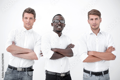 three confident business men standing together