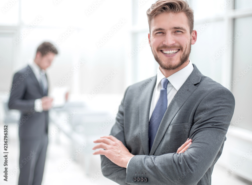 successful businessman on the background of the office successful businessman on the background of the office