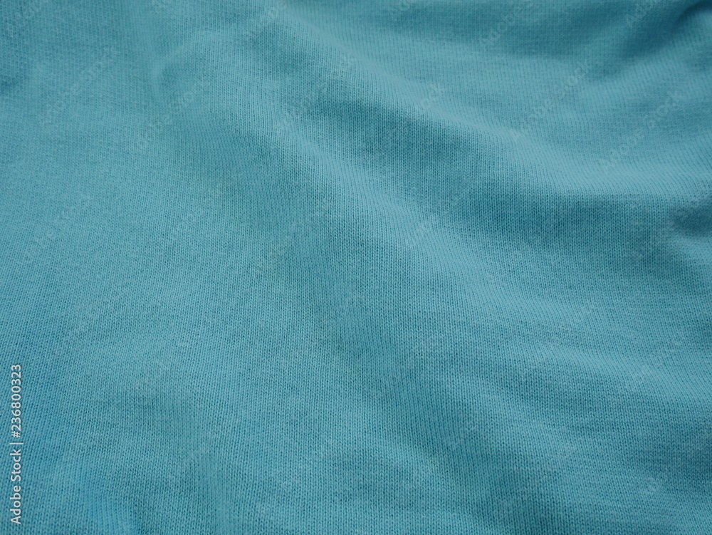 Fototapeta premium green silk fabric background,cotton cloth texture,green fabric satin