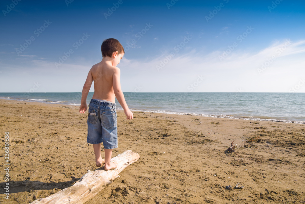 Child play on the beach