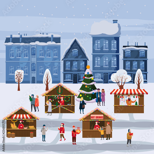 Christmas market or holiday outdoor fair on town square. Christmas tree. People walking between decorated stalls, canopy or kiosks, buying snacks,gifts, decoration and drinking hot coffe, tea and