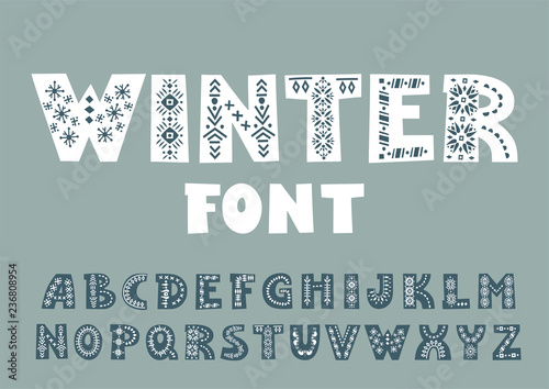 Vector bold alphabet decorated with nordic folk ornaments.  Display font.