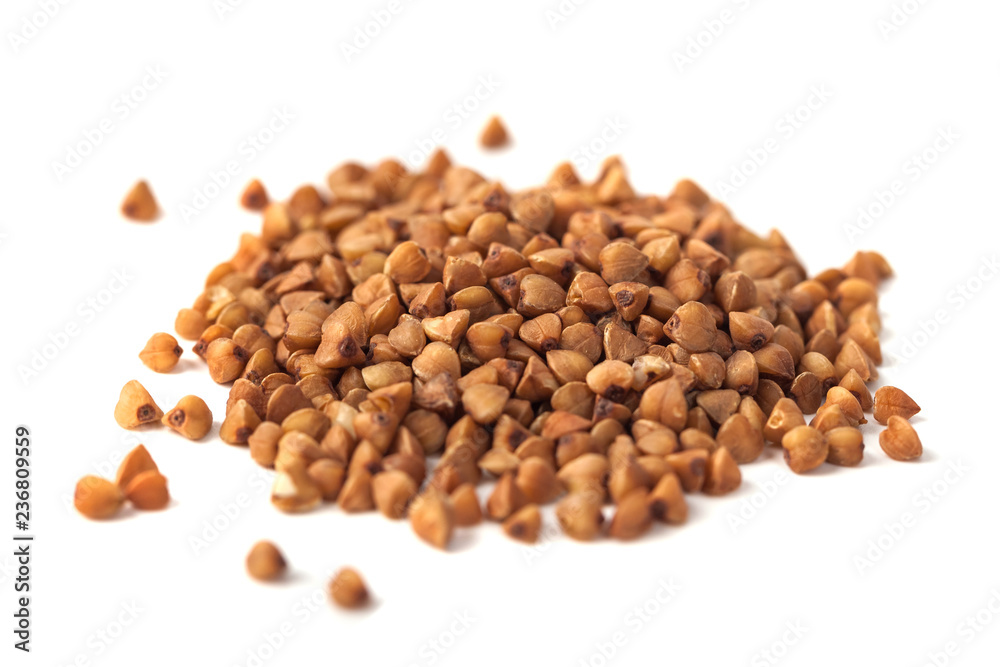 Buckwheat grain isolated on white background, healthy wood Buckwheat grain isolated on white background, healthy wood