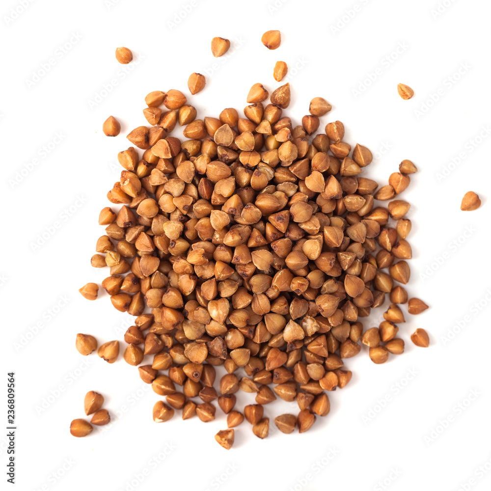 Buckwheat grain isolated on white background, healthy wood Buckwheat grain isolated on white background, healthy wood