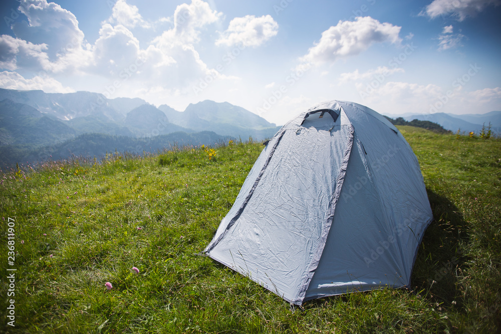 Tent on the background of mountains