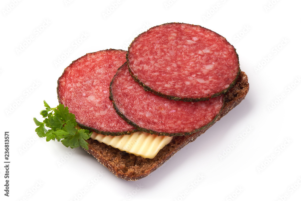 Salami Sausage Sandwich with parsley, isolated on a white background. Close-up Salami Sausage Sandwich with parsley, isolated on a white background. Close-up