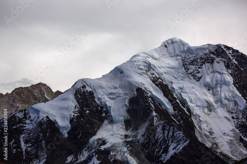 Snow Mountains and Glaciers - Ganzi Tibetan Autonomous Prefecture  Sichuan Province China. Chinese landscape - Yaha Pass Scenery near Gongga Mountain  Minya Konka. Jagged Peaks  Ice Covered Mountains