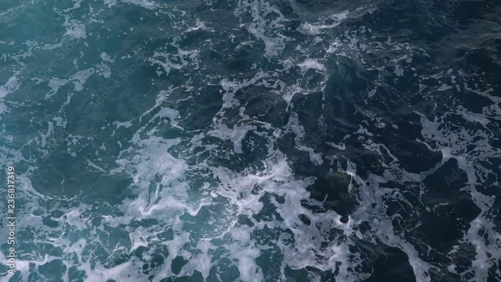 foamy azure ocean waves and currents