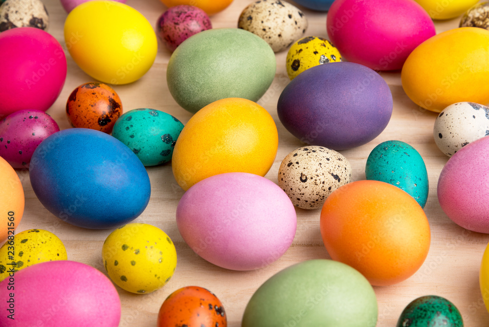 colorful easter eggs on a wooden background, top view colorful easter eggs on a wooden background, top view
