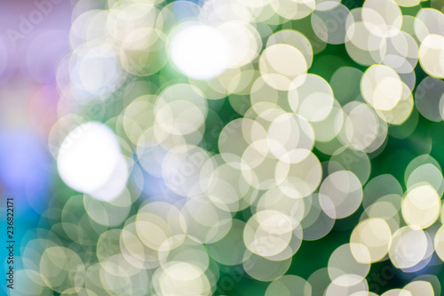 defocus of christmas tree background with shining lights © lunx