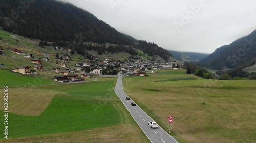 High above the village of Liddes in the alps photo