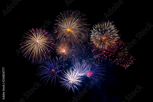 Fireworks on black background, holiday celebration concept