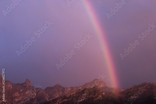 Mountainscape With Rainbow