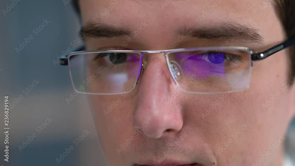 The doctor works in the office in the hospital for a laptop. Looks at the x-ray of the skull. Talking Phone. The doctor works in the office in the hospital for a laptop. Looks at the x-ray of the skull. Talking Phone.
