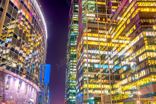 Panorama of the night skyscrapers of the Moscow business center, a lot of luminous offices with bright lights