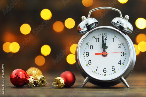 New Year countdown. Midnight clock and Christmas balls