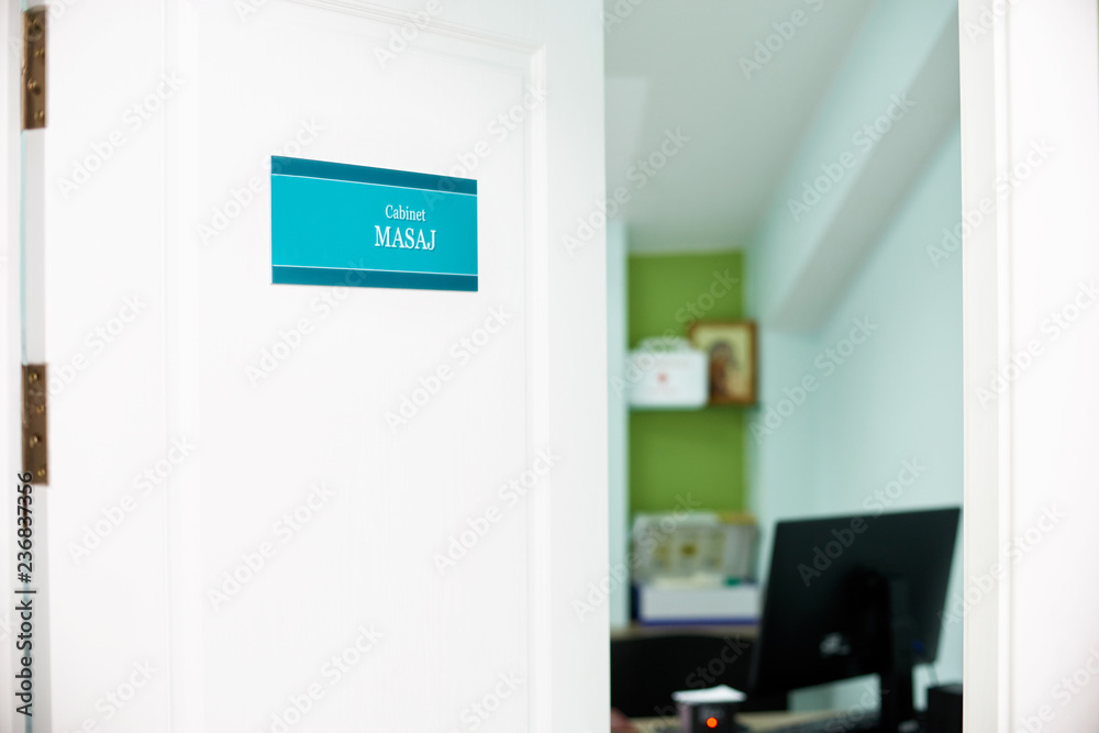 plate on the door masseur. The door to the office is a masseuse.