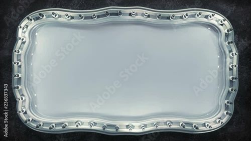 White marquee board sign with shining ligh bulbs. Computer generated abstract motion background. 3D render seamless loop animation 4k UHD 3840x2160
