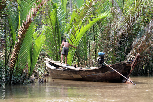 fisherman on the river mekong - Vietnam photo