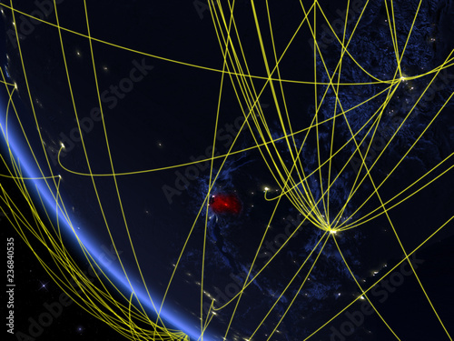 Rwanda on planet Earth from space at night with network. Concept of international communication, technology and travel. photo