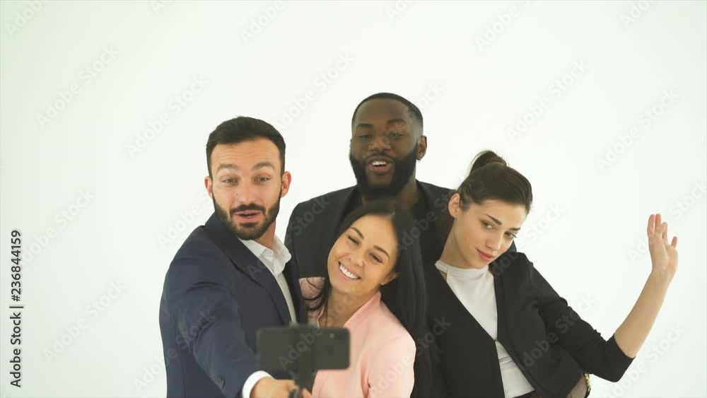 The business people taking selfie on the white background The business people taking selfie on the white background