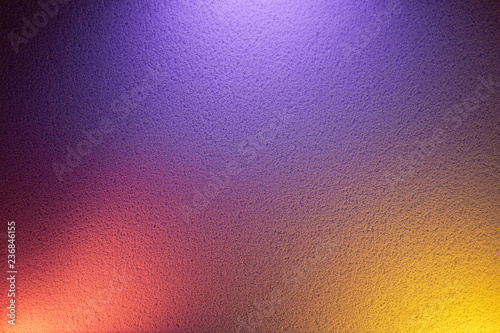 Yellow and pink glow on purple background